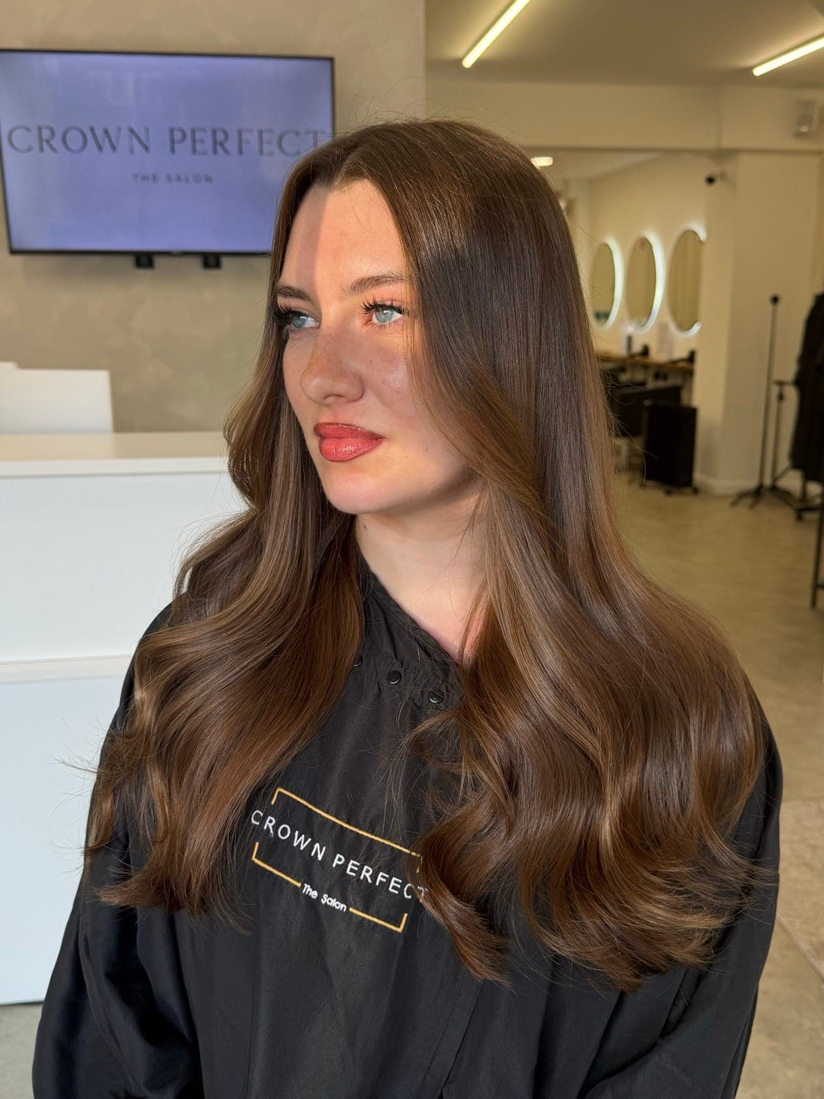 A long brunette colour and glossy blow-dry transformation, after